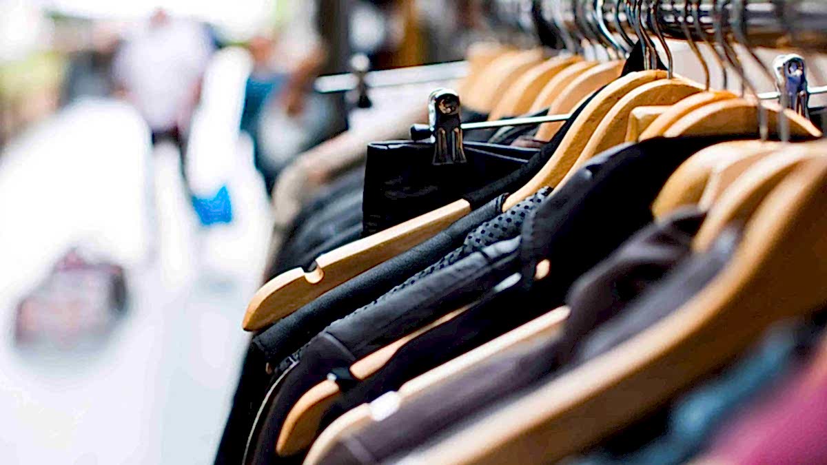 An image of the corner of a clothes rail in a retail park