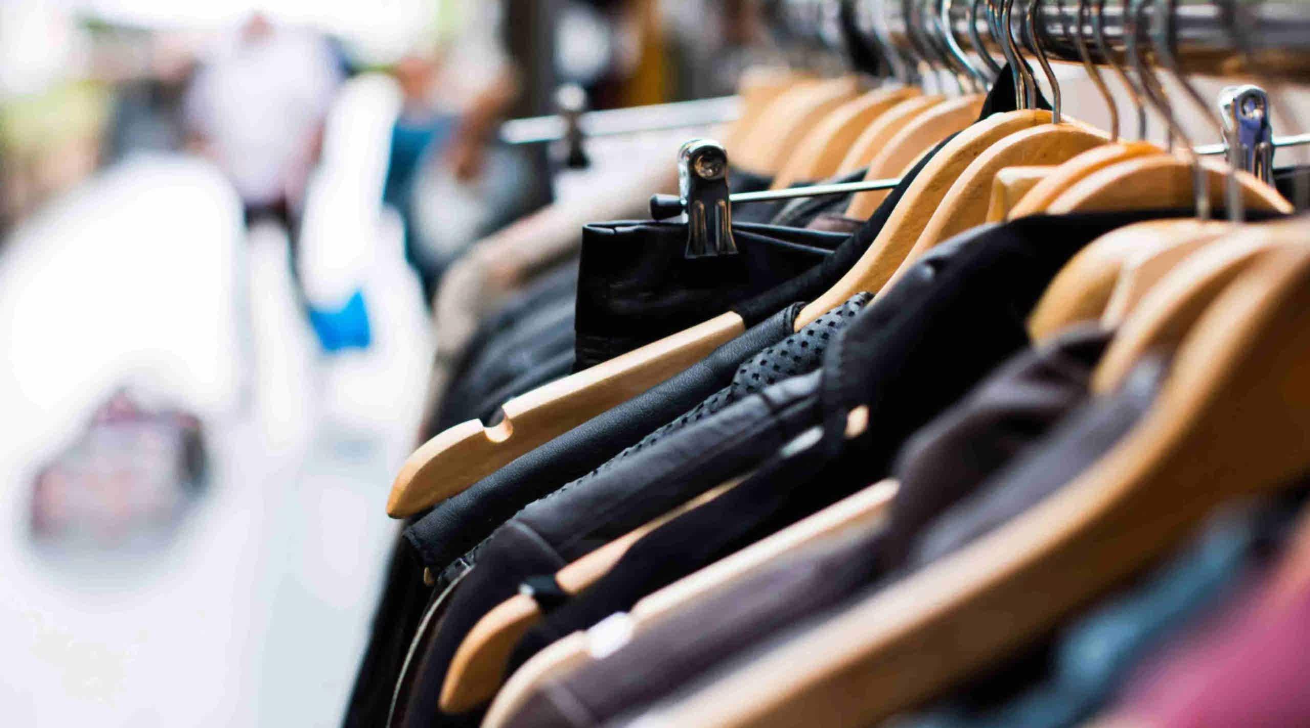 An image of the corner of a clothes rail in a retail park 